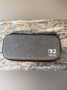 Nintendo Switch 2 Gray Carry Case with Red Zipper Accent